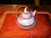Mushroom earthenware teapot steamed